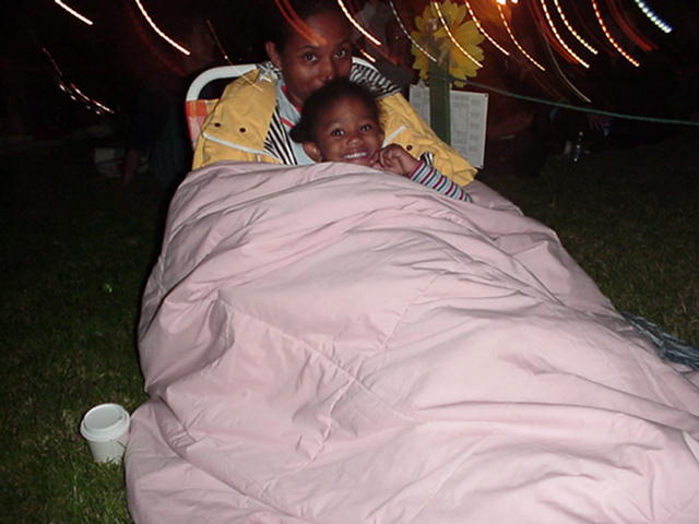 Experienced movie goers all snug as a bug.